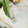 Flower Pendant with Orange Sapphire - Sterling Silver Chain - Kathy Sayce Jewellery