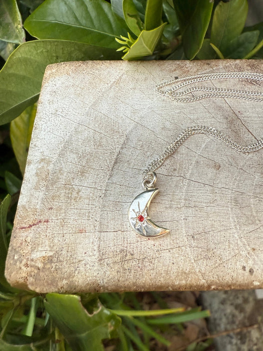 Silver Crescent Moon Necklace with Red Sapphire - Kathy Sayce Jewellery